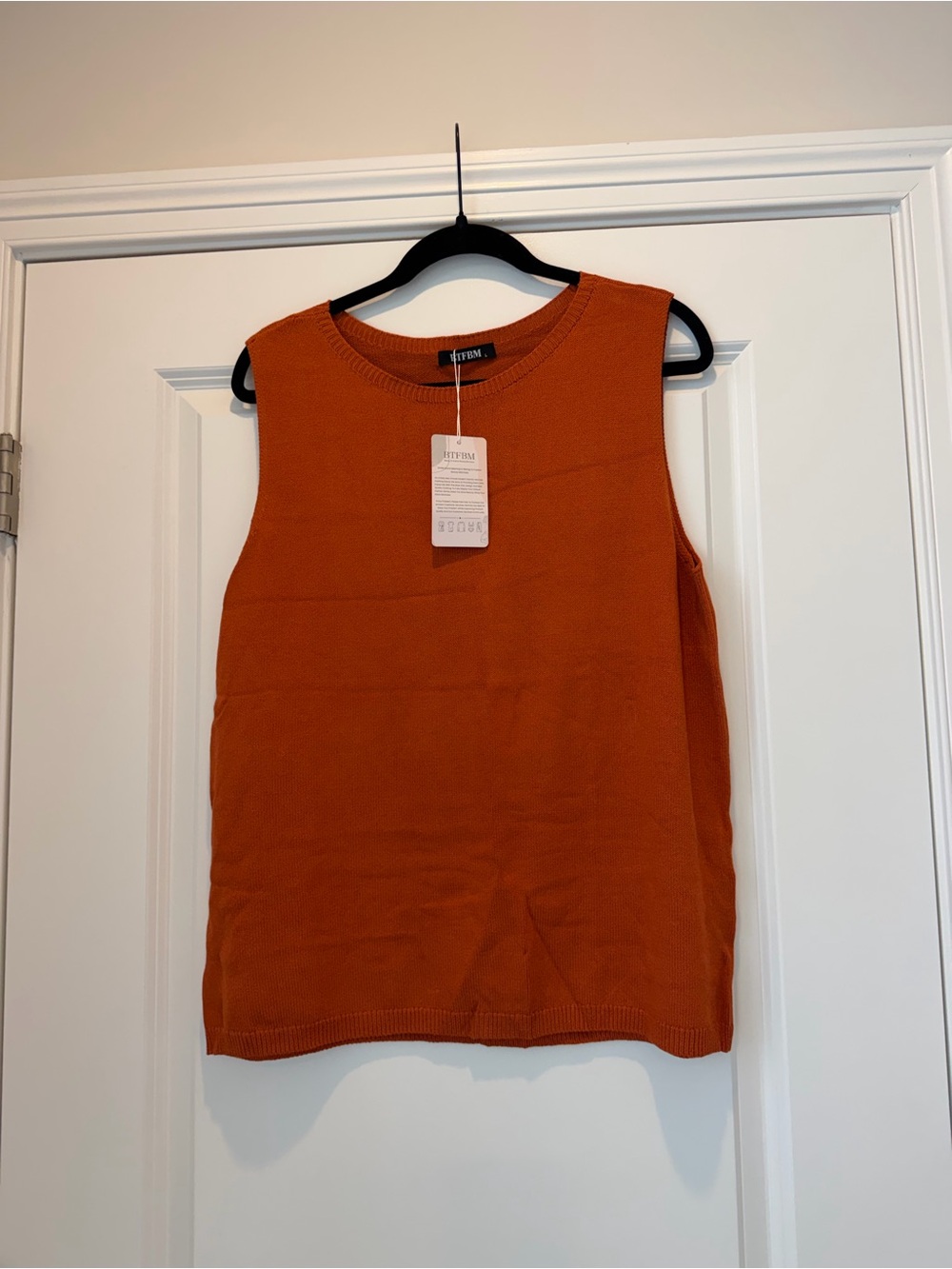 Orange Sleeveless Knit Tank from BTFBM